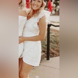 White lace mini dress with ruffle sleeves